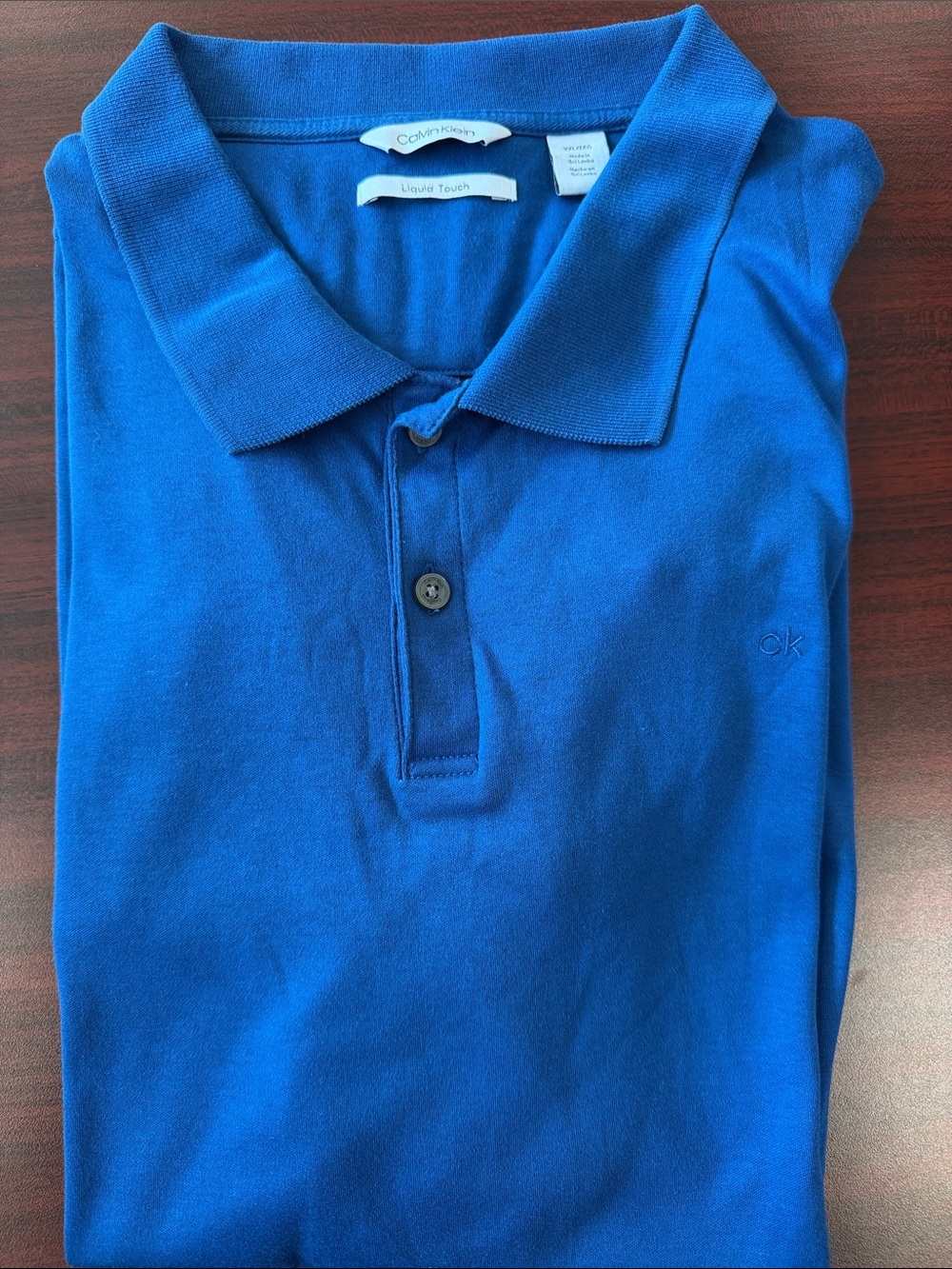 Calvin Klein Liquid Touch Blue Polo Shirt – Men’s Classic CK Logo